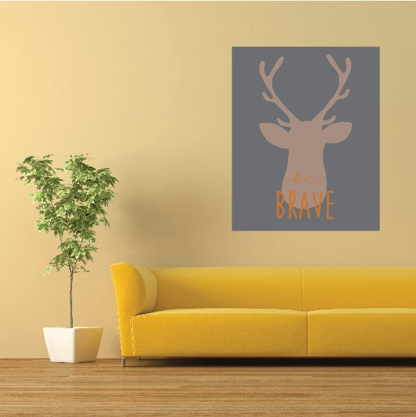 Deer antler sticker on gray background with orange “BRAVE” text