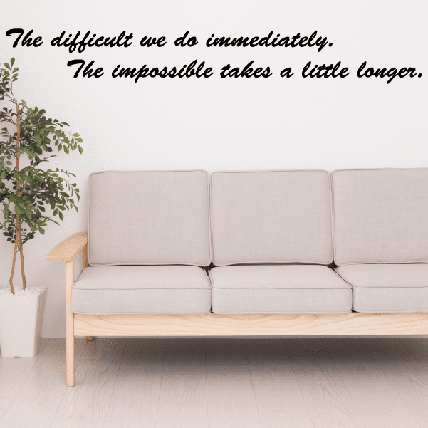 Cursive wall decal text: difficult we do immediately, impossible takes a little longer.