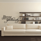 Cursive wall decal with quote: 'The essence of pleasure is spontaneity'.