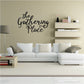 The Gathering Place wall decal with cursive text on the wall