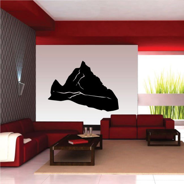 Mountain silhouette wall decal with black peak shape on light rectangular panel