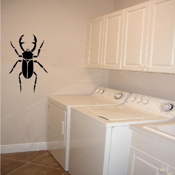 Beetle wall decal with thin-lined bold silhouette, black design