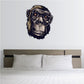 Thinking Ape sticker with illustrated monkey face, dark blue and gold eyes
