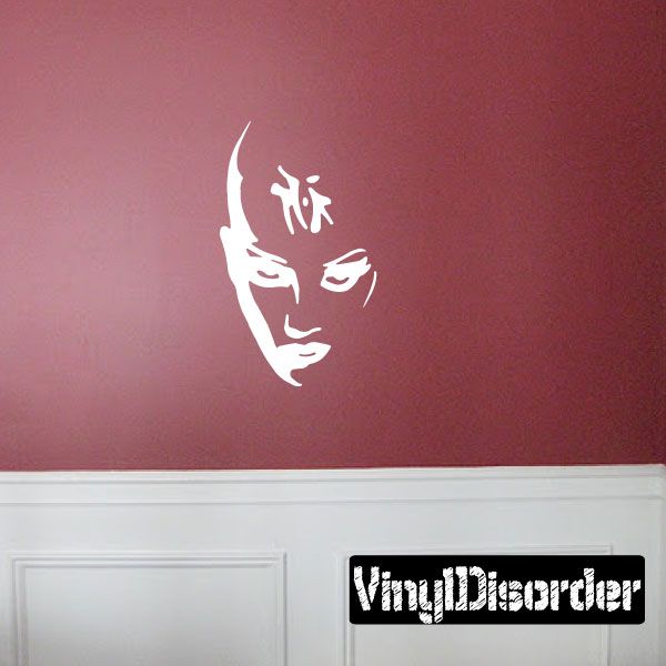 Stylized woman face decal with third eye, white outline