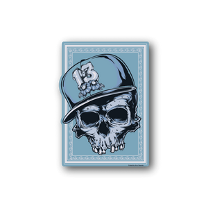Skull vinyl sticker showing a skull in a blue hat holding flowers