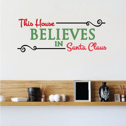 Image of This House Believes in Santa Claus Printed Decal