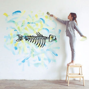 Skeleton fish wall decal, black skeletal fish with wide eye and open mouth.