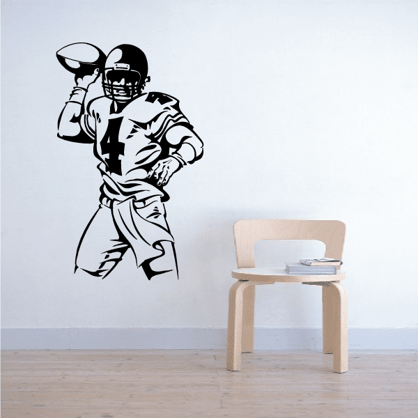 Throwing quarterback football player decal, black-and-white figure with jersey number 4