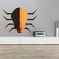 Tick crawling sticker with dark brown body and orange belly, sharp black legs