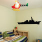 Wall decal of a black cruiser ship silhouette on the wall