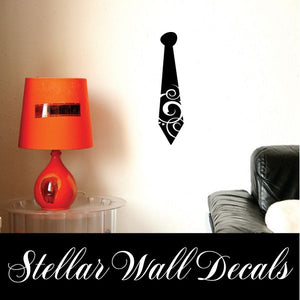 Black decorative vinyl wall decal with swirl figure and circular motif