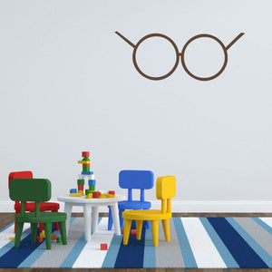 Brown round glasses outline decal with thin arms and bridge