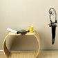 Tilted parrot head wall decal, white face with black outline and beak