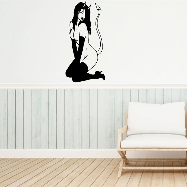 Black seated devil girl decal with horns, tail, and curled-up pose