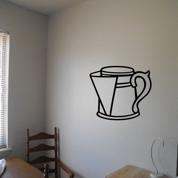 Tin water jug wall decal with black outline drawing of a watering jug