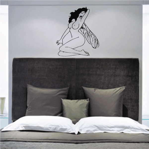 Fairy decal of a sitting winged girl with a long flowing robe