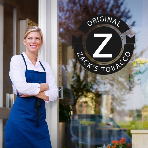 Round vinyl decal with "ZACK'S TOBACCO" text in black and white