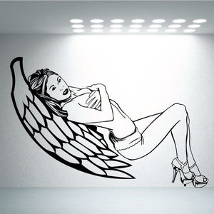 Angel decal with black line art of a winged figure lying on a cloud