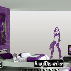 Vinyl wall decal of dominatrix with whip, purple figure