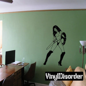 Shieldmaiden wall decal, black silhouette of a warrior holding round shield and spear