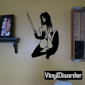 Warrior woman looking-back wall decal with bare chest and raised sword