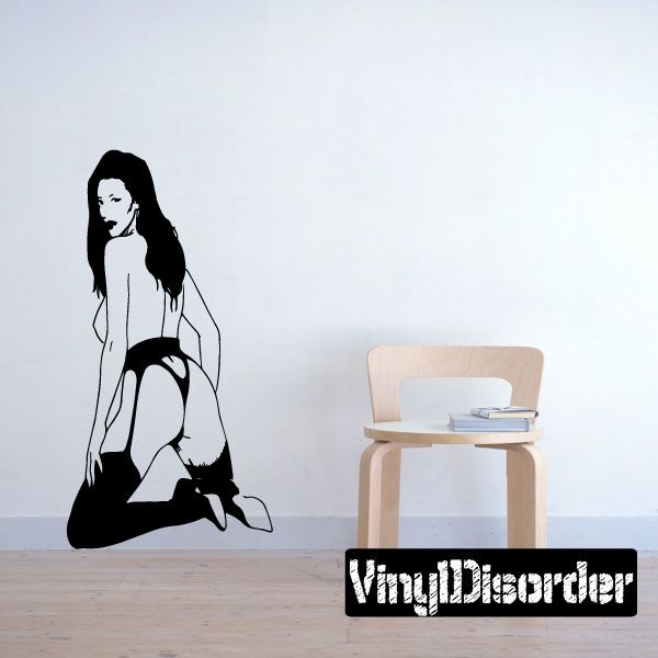 Decorative vinyl decal of a pin-up woman in heels with garter belt