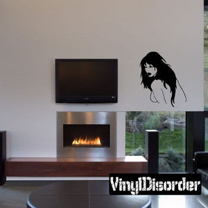 Black silhouette woman looking back wall decal with long flowing hair