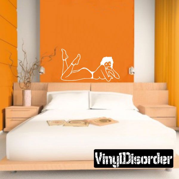 Pinup woman lounging wall decal with white outline and retro silhouette
