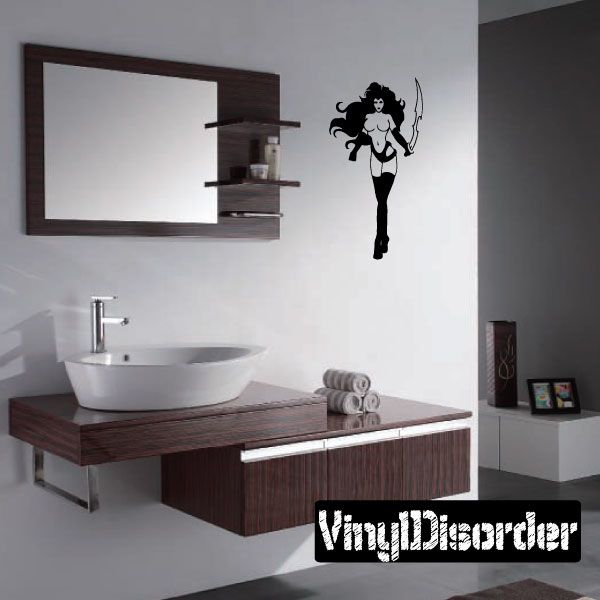 Black woman silhouette wall decal with curved sword, high-contrast design