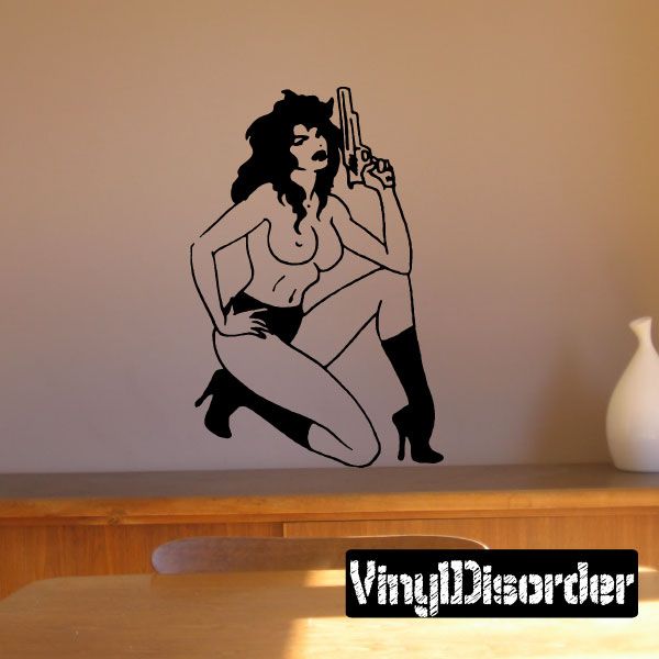 Woman with handgun vinyl wall decal, black outline graphic