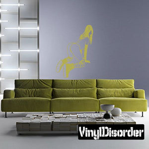Wall decal of woman silhouette with striped socks and boots