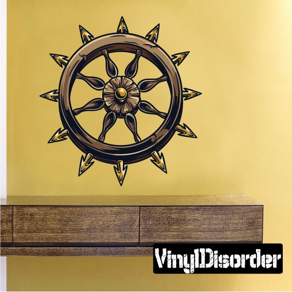 Round torture wheel printed decal with spiked rim and dark flower center