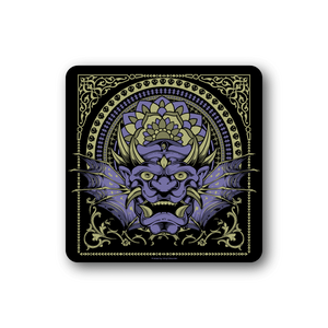 Square vinyl sticker with ornate purple and gold face mask design, decorative border.