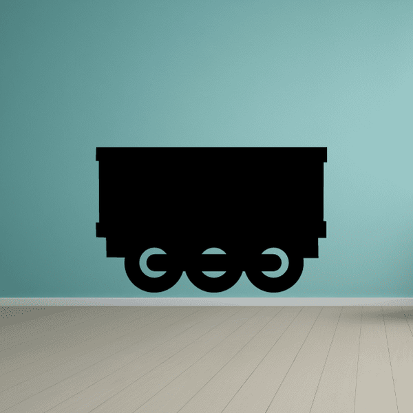 Train box car decal featuring a black box car with large circular wheel shapes