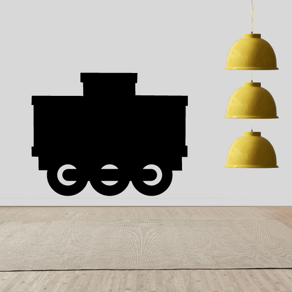 Black train caboose decal with circular wheels and stylized lettering