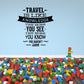 Inspirational wall decal with black typography: 'TRAVEL IS LIKE KNOWLEDGE'