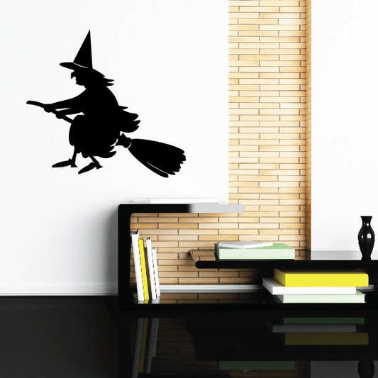 Image of Traveling Halloween Witch on broom Decal