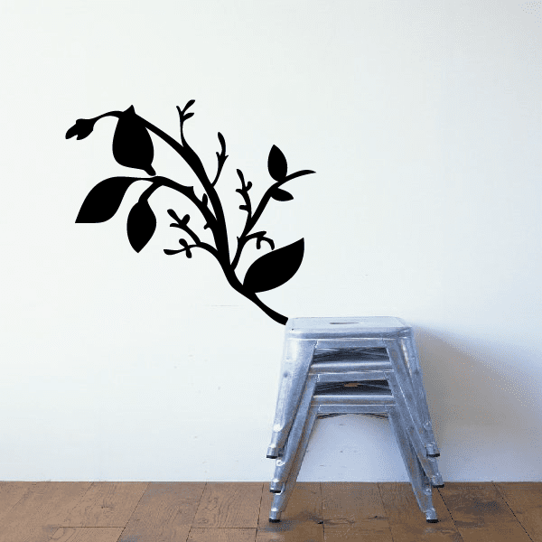 Tree branch decal with leafy branch silhouette in black