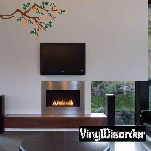 Tree branch wall decal with orange and green leaves