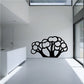 Tree wall decal featuring a black tree silhouette with clustered round leaves