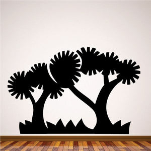 Black tree wall decal vinyl silhouette with three canopies and ground leaves