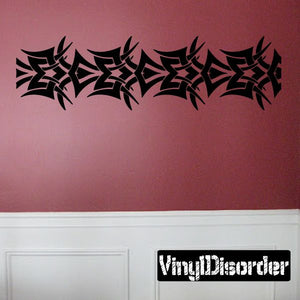 Tribal wall decal with black interlocking fan-like shapes