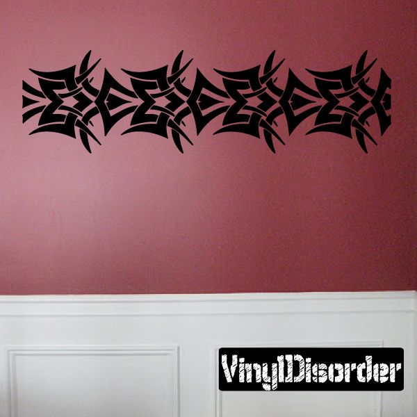 Tribal wall decal with black interlocking fan-like shapes