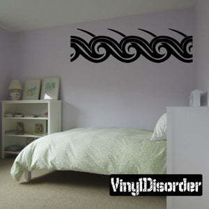 Tribal wall decal border in black with swirling wave patterns