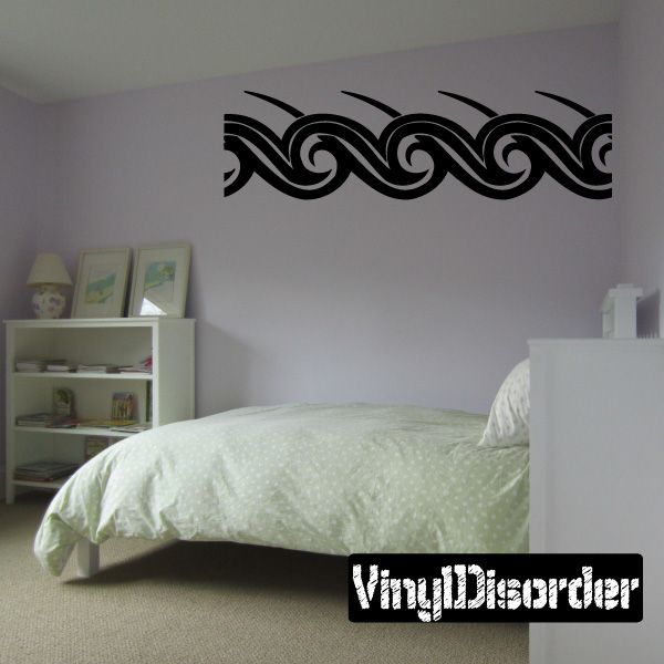 Tribal wall decal border in black with swirling wave patterns