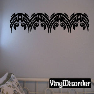 Black tribal bracelet wall decal with four stylized eye motifs, vinyl sticker