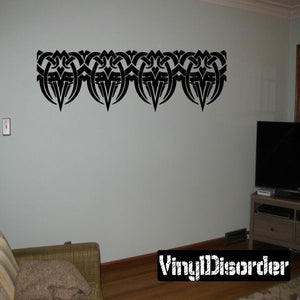 Tribal bracelet wall decal with black interlaced ribbon pattern