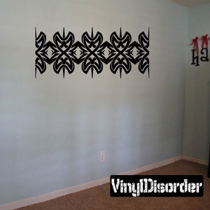 Tribal wall decal with black interlocking flame-like motifs strip