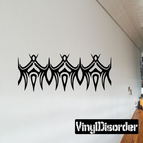 Black tribal bracelet wall decal with repeating arches and dripping details