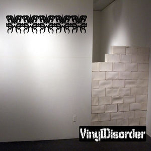 Tribal bracelet wall decal, black repeating border with ornate loop motifs